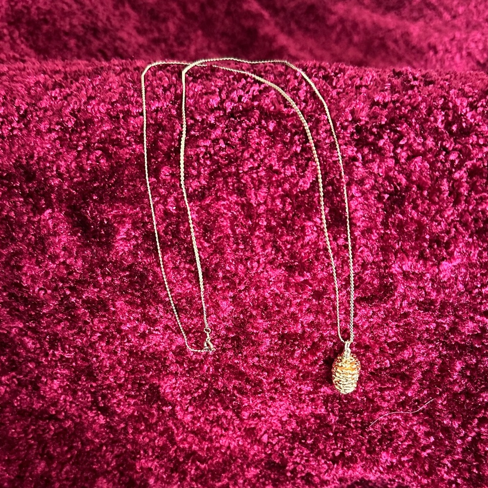 Pinecone Necklace with 26” chain. Vintage piece in great condition.